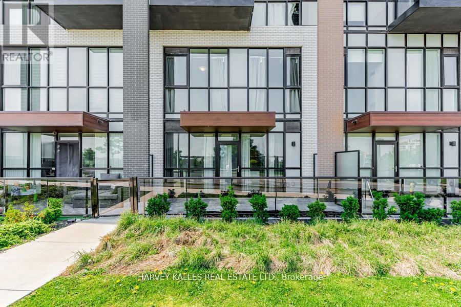 4 - 60 George Butchart Drive, Toronto, Ontario  M3K 0E1 - Photo 2 - W12399798