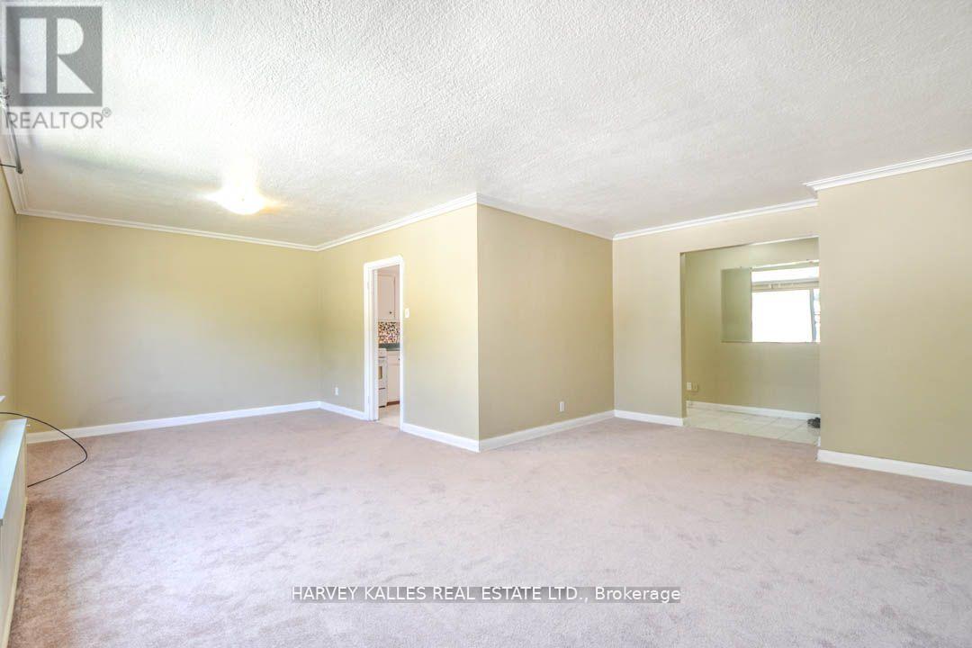 90 Trethewey Drive, Toronto, Ontario  M6M 4B4 - Photo 2 - W12501900