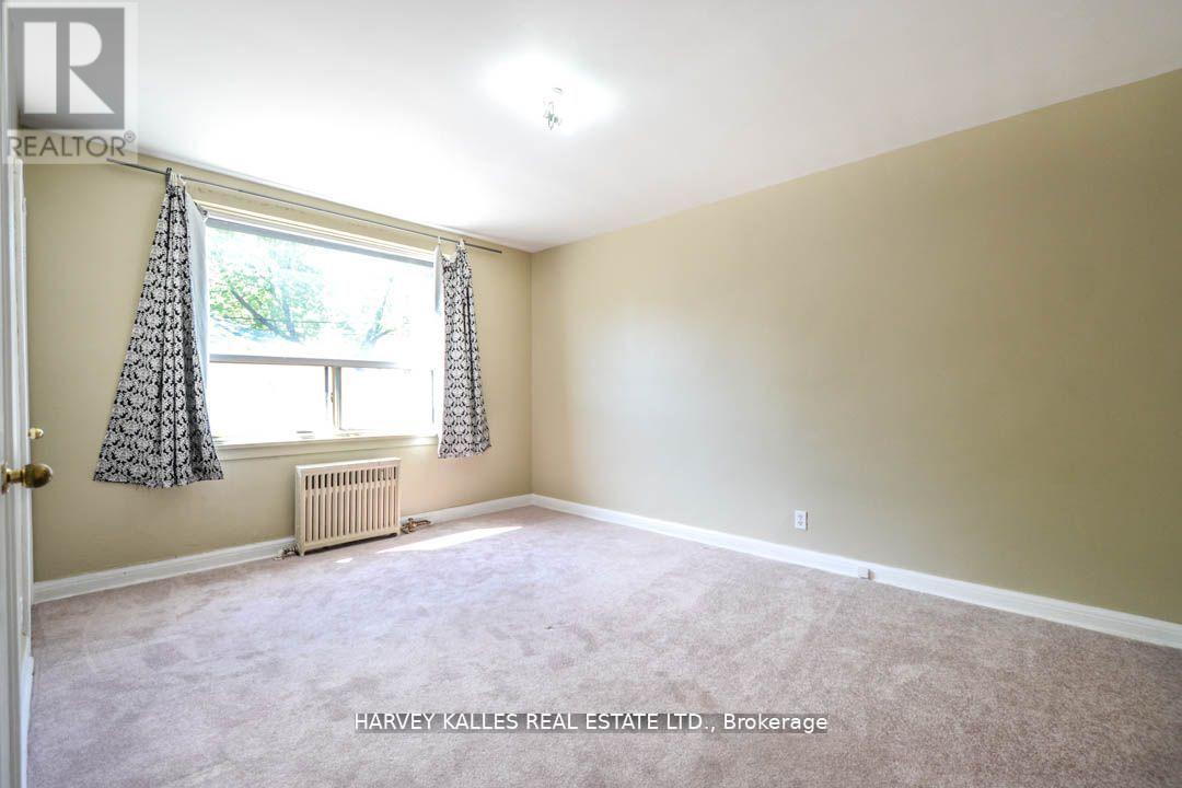 90 Trethewey Drive, Toronto, Ontario  M6M 4B4 - Photo 9 - W12908662