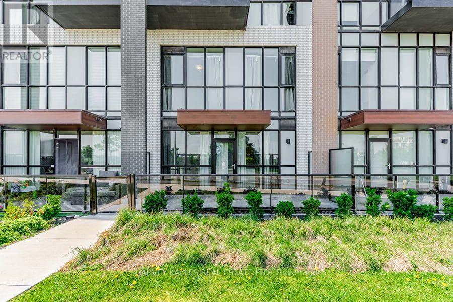 4 - 60 George Butchart Drive, Toronto, Ontario  M3K 0E1 - Photo 2 - W13539406